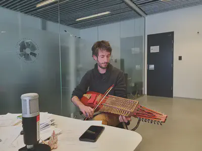 Playing nyckelharpa at H&aacute;sk&oacute;linn &iacute; Reykjav&iacute;k during a research interview about folk music